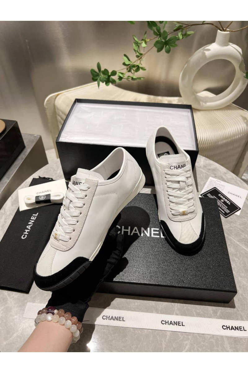Chаnеl Женские кожаные кроссовки белого цвета