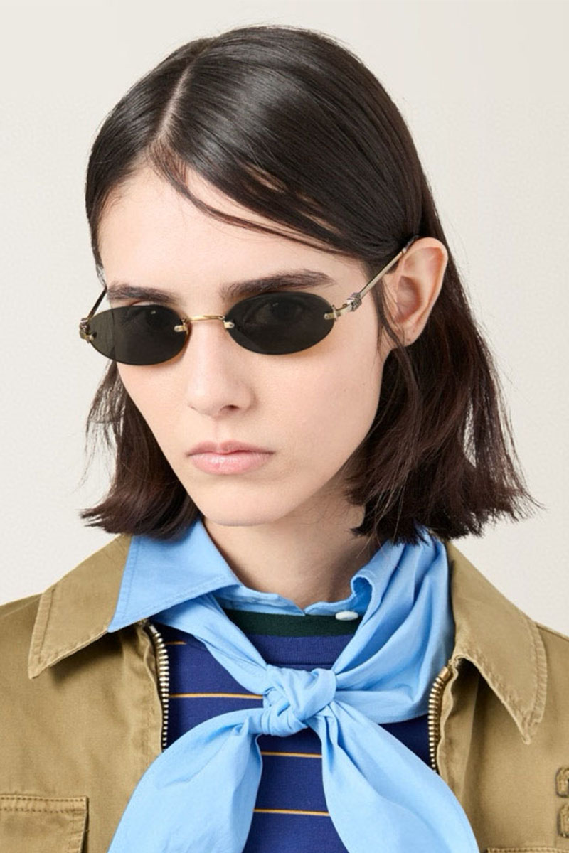 MIU MIU Женские солнцезащитные очки с чёрными линзами