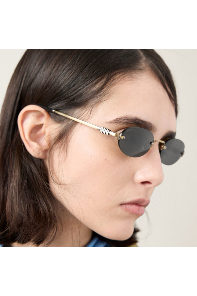 MIU MIU Женские солнцезащитные очки с чёрными линзами