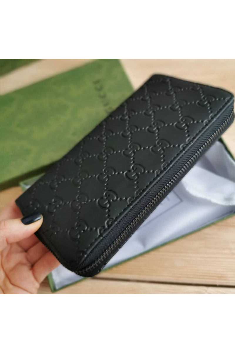 Gucci Кожаное портмоне GG embossed 20х10.5 см