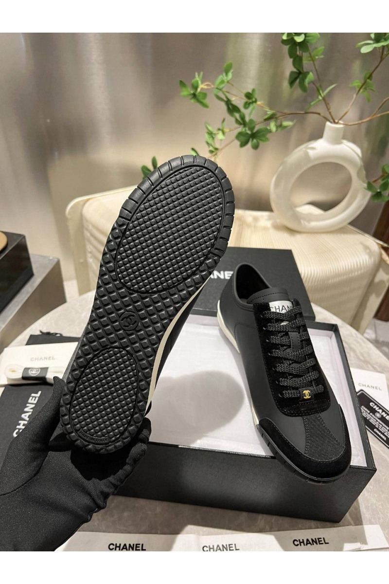 Chаnеl Женские кожаные кроссовки чёрного цвета