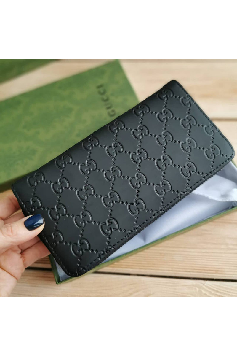 Gucci Кожаное портмоне GG embossed 20х10.5 см
