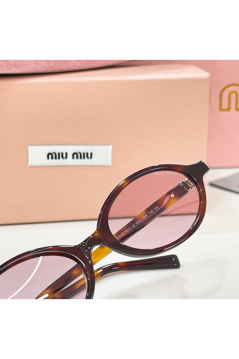 MIU MIU Солнцезащитные очки с леопардовой оправой