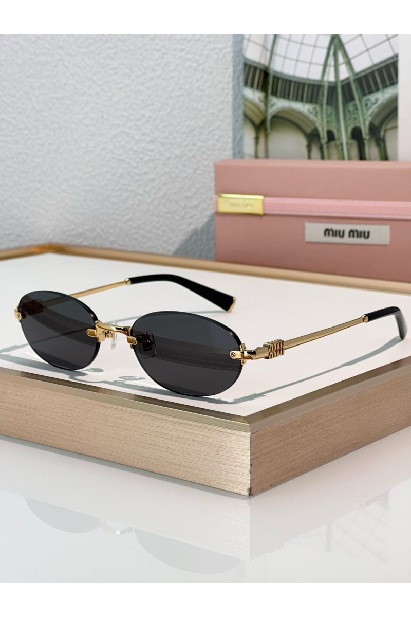 MIU MIU Женские солнцезащитные очки с чёрными линзами