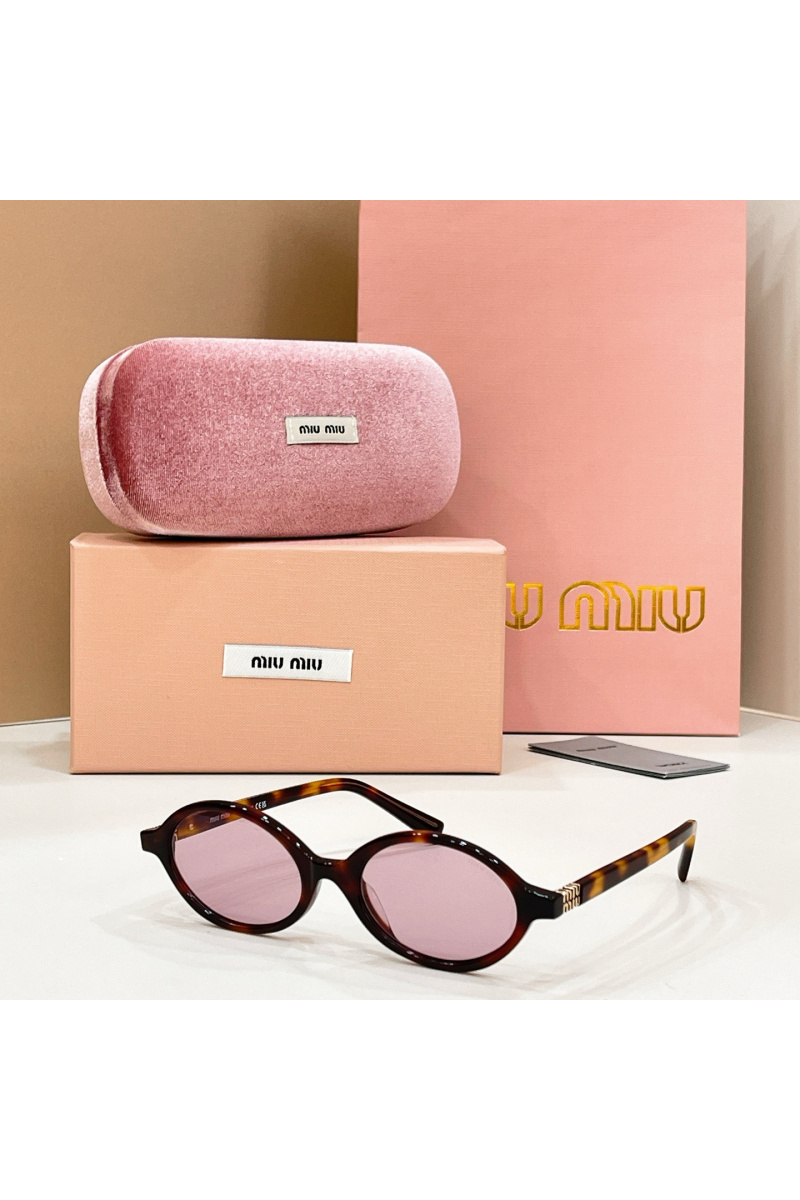 MIU MIU Солнцезащитные очки с леопардовой оправой