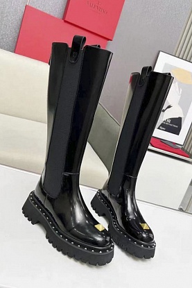 Женские кожаные сапоги мехом 