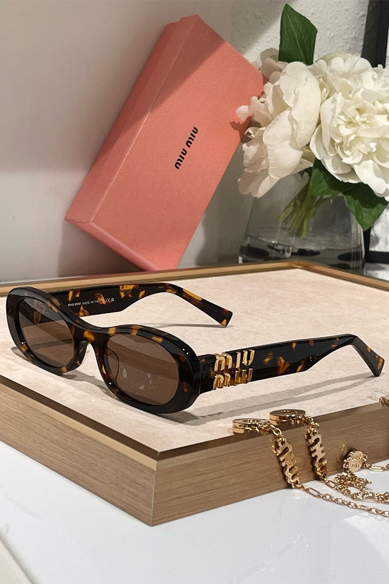 MIU MIU Женские солнцезащитные очки с леопардовой оправой
