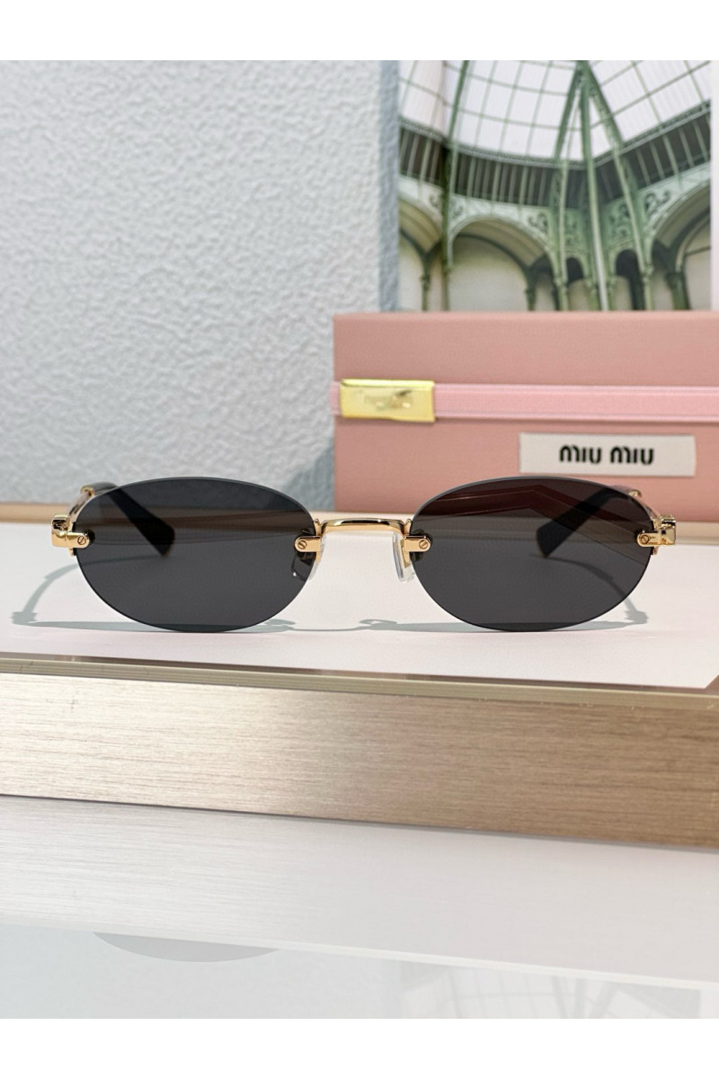 MIU MIU Женские солнцезащитные очки с чёрными линзами