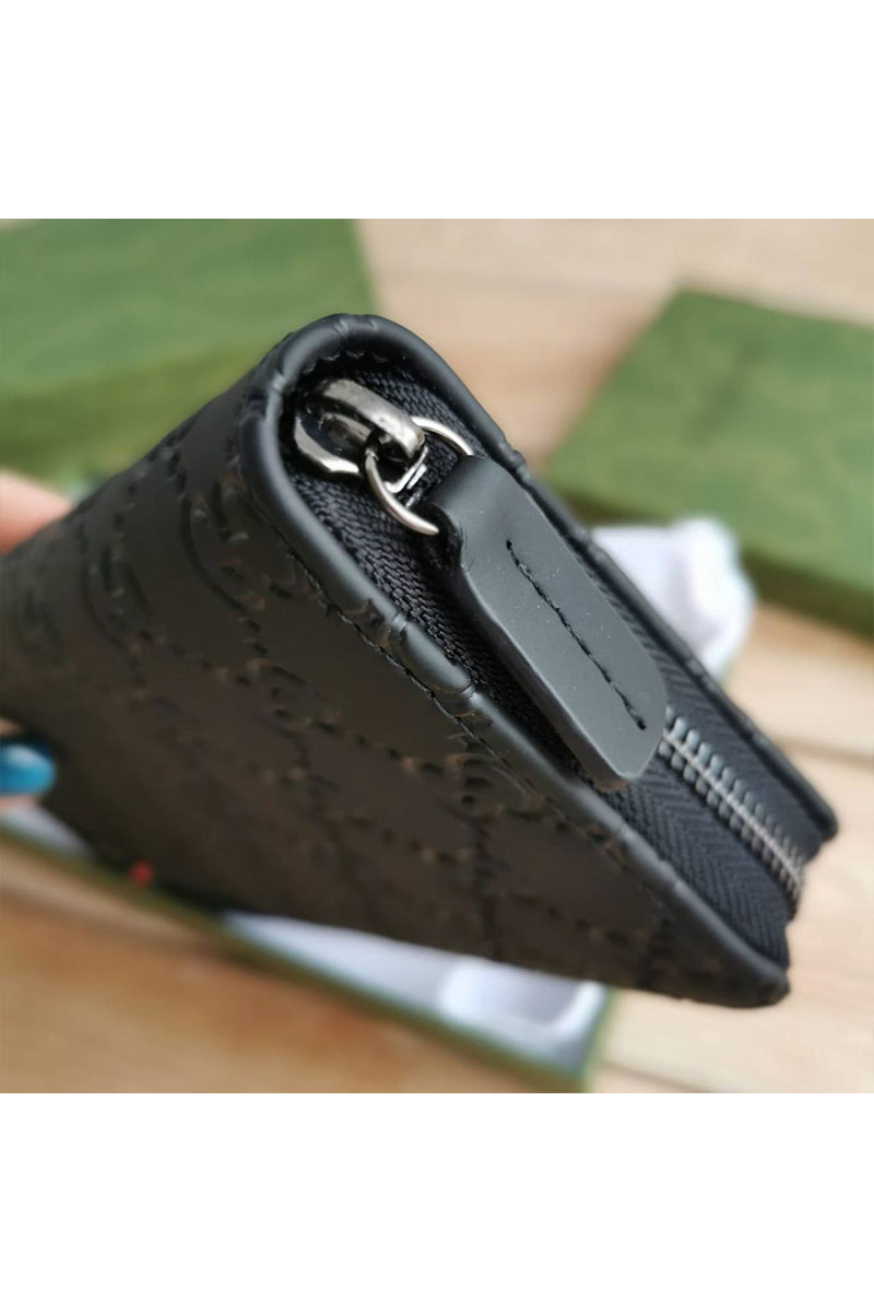 Gucci Кожаное портмоне GG embossed 20х10.5 см