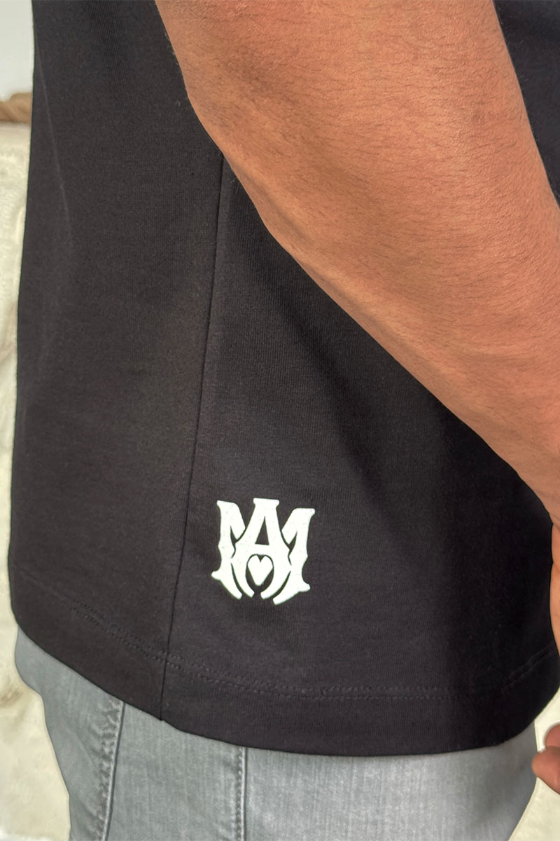 Amiri Футболка чёрного цвета staggered logo