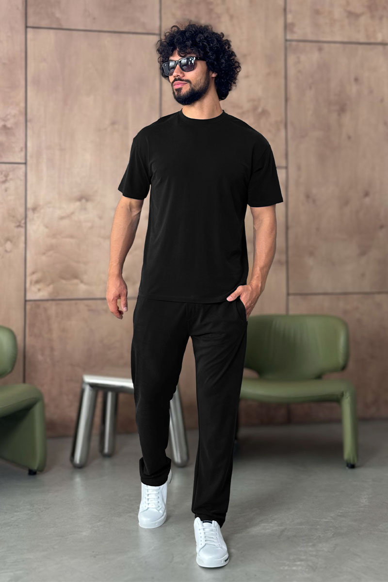 Brioni Мужской костюм чёрного цвета 