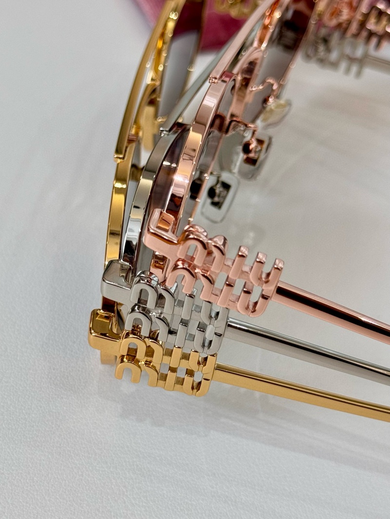 MIU MIU Женские солнцезащитные очки Oval