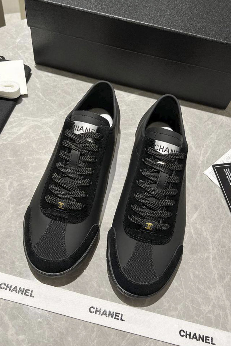 Chаnеl Женские кожаные кроссовки чёрного цвета
